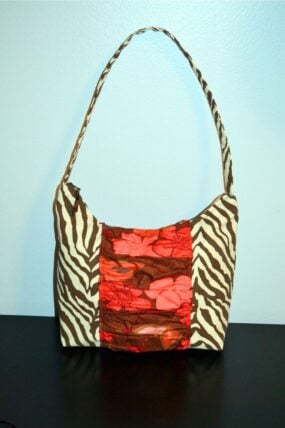 brown zebra zipper purse