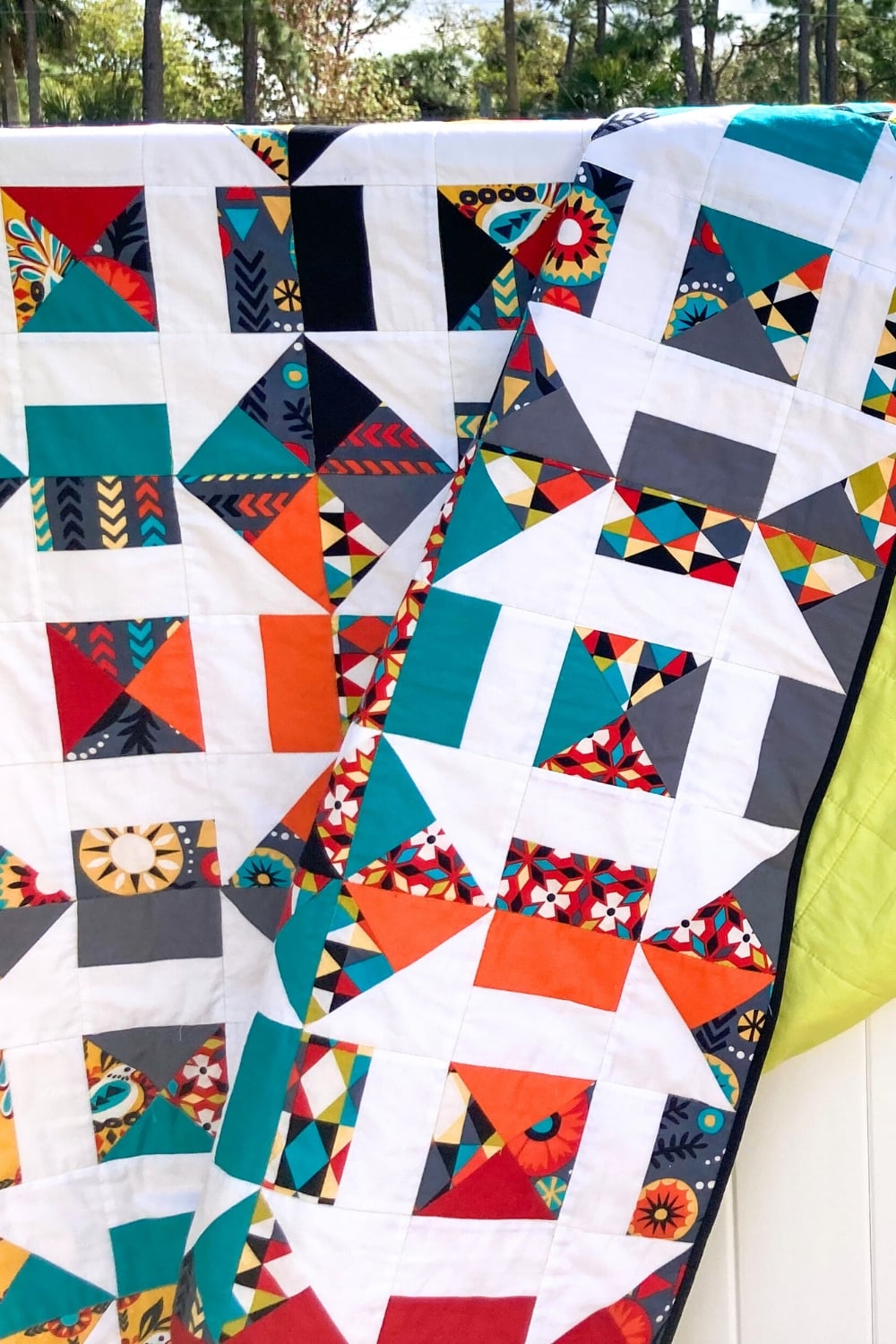 Bejeweled Churn Dash Quilt