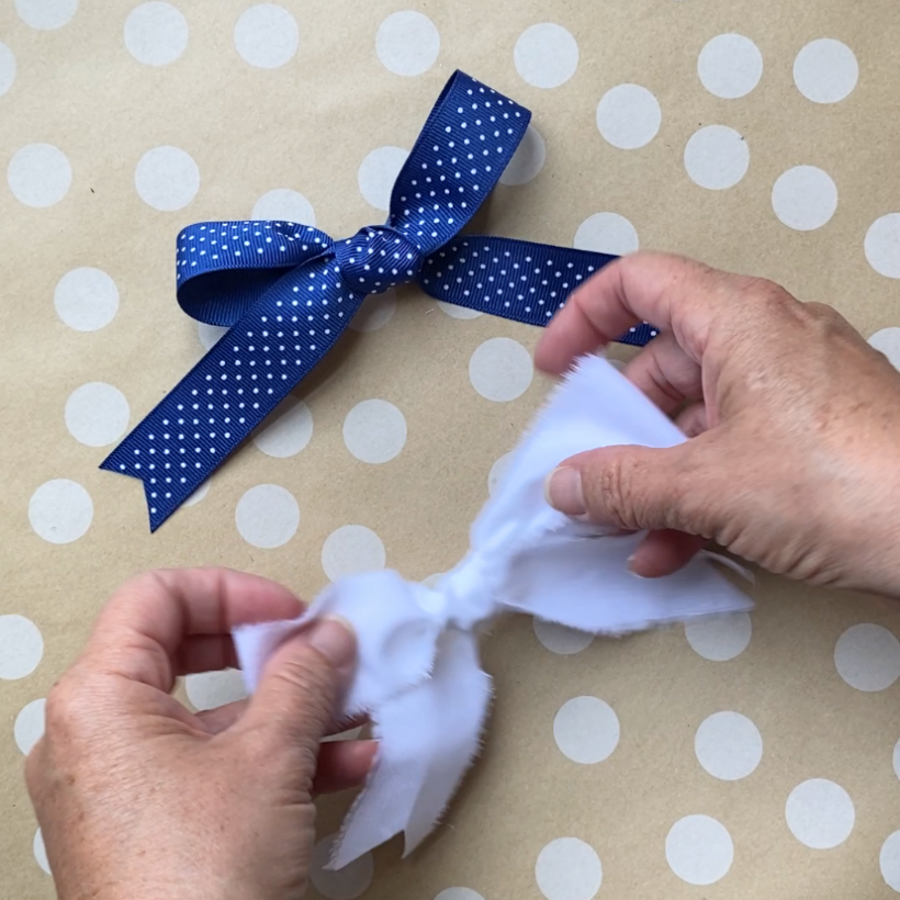 Tie a bow for a bow garland
