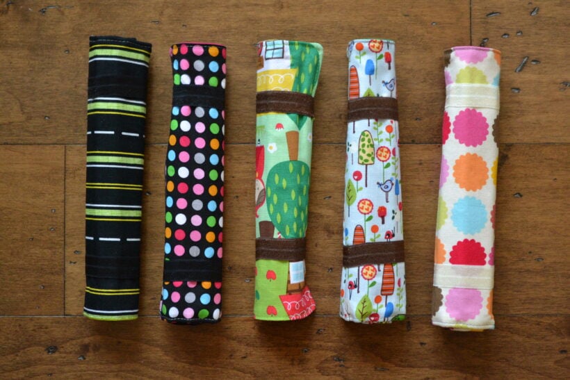5 colored pencil holders rolled up