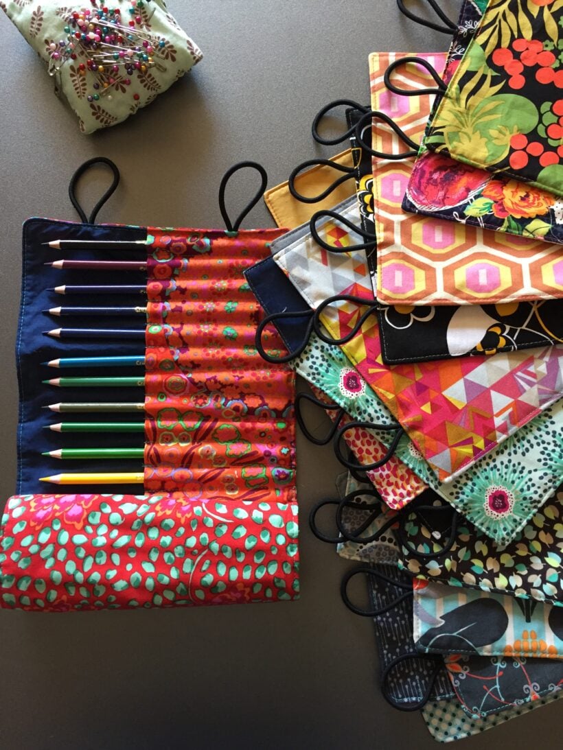 colored pencil roll with elastic hair ties